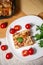 Portion of tasty italian lasagne served on white plate