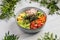 Portion of tuna poke bowl with vegetables