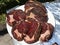 Portioned meat prepared for processing for bbq