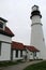 Portland Head lighthouse, with stormy skies and rough seas, Maine,2016