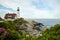 Portland Head Lighthouse Surrounded by Beach Roses in Maaine