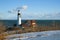 Portland Head Lighthouse Tower Decorated with Large Wreath in Maine During Holiday Season