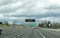 Portland, OR / USA - March 29 2020: Electronic sign on I205 freeway notifying people to stay home and save lives by reducing the