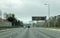 Portland, OR / USA - March 29 2020: Electronic sign on i84 freeway notifying people to stay home and save lives by reducing the