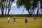 Porto Alegre, Rio Grande do Sul,Brazil - children play football near the lake