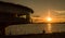 Porto Alegre, Rio Grande do Sul, Brazil, March 29 - 2021: Panoramic restaurant on the GuaÃ­ba waterfront in silhouette at sunset