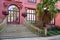 Porto Botanical Garden. Main entrance, pink facade of Casa Andresen, Porto, Portugal