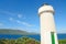 Porto Conte lighthouse under a blue sky