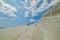 PORTO EMPEDOCLE, ITALY - AUGUST, 2015: Some tourists in the beach Scala dei Turchi, one of the most beautiful beaches in Sicily, o