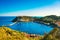 Porto Ercole village and harbor in a sea bay. Aerial view, Argen