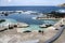 Porto Moniz, Madeira / PORTUGAL - April 20, 2017: Lava pools complex with people on the end of Madeira winter season, pool water