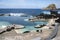 Porto Moniz, Madeira / PORTUGAL - April 20, 2017: Lava pools complex with people on the end of Madeira winter season, pool water