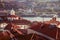 Porto panoramic landmark with boats and ferris wheel. Brick red roofs of portuguese buildings.