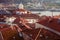 Porto panoramic landmark with boats and ferris wheel. Brick red roofs of portuguese buildings.