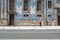 Porto, Portugal - April 4, 2017: Woman walking in front of a tiled facade of Igreja do Carmo in P