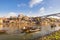 Porto Portugal city skyline at Ribeira and Douro River with Rabelo wine boat