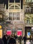 Porto, Portugal - December 9, 2023. Night scene of crowd of people in front of monumental facade of Library Lello and Irmao, one