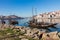 PORTO, PORTUGAL - JANUARY 18,2018: Boats carrying barrels of porto wine seen docking at river bank. Panorama View on Porto, Duoro