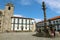 PORTO, PORTUGAL - JUNE 20, 2018: People resting near the Pillory Pelourinho column on the Porto Cathedral Se do Porto square