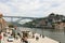 PORTO, PORTUGAL - JUNE 21, 2018: Porto old town, Portugal. Panoramic view at Ponte Dom Luis I on Douro river and medieval