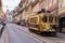 Porto, Portugal - October 06, 2018: Vintage wooden tram in city centre Porto. Traditional trams rattle through the narrow streets