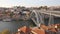Porto, Portugal: overview of iconic Dom Luis I bridge over Douro river, and historical downtown district of La Ribeira