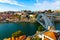 Porto, Portugal, picturesque view at Riberia old town and Ponte de Dom Luis bridge over Douro river.