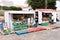 Porto Santo Island, Portugal: some women are buying fruit and vegetables in a street market