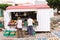 Porto Santo Island, Portugal: Two women are buying fruit and vegetables in a street market