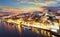 Porto at twilight with reflection in Douro river. Portugal