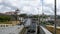 Porto yellow tram train passing on the luis 1 bridge. Above view static shot