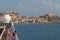 Portoferraio, Elba Island, Italy - Jul 10, 2019: Medieval town on sea shore and deck of cruise liner