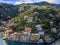 Portofino,Genoa,Italy on April3,2023:colourfully painted buildings and beautiful habour in spring