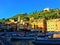 Portofino Italian village in Liguria region, Italy. Boats, water, lights and colours