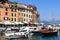 Portofino port with colorful houses, boats and Mediterranean Sea