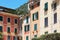 Portofino typical colorful houses facades in Italy, sunny day