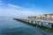 Portoroz central beach with pier and resort buildings