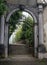 Portoroz, Slovenia - October 17, 2016: The stone arched gateway adorned with decoration and sculptural head.