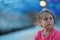 Portrait of 4 year old girl on the blurred background of the subway