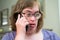 Portrait of a 40 yo woman with the Down Syndrome calling her family on the phone, Belgium