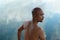 Portrait of 40s topless Asian Japanese skin head bald beard man with summer blue nature sky reflection in eater background