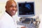 Portrait Of 4D Ultrasound Scanning Machine Operator And Doctor