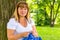 Portrait of 50-year-old woman engaged in knitting