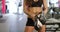Portrait of active fitness woman`s waist and well trained stomach