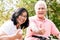 Portrait of active senior couple standing on bicycles