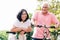 Portrait of active senior couple standing on bicycles