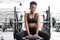 Portrait of adorable african lady sitting in gym