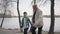 Portrait adorable grandfather and cute little grandson walking in the park together. Generations concept. Friendly