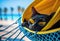Portrait of an adorable lazy Bombay cat in sunglasses laying in a hammock on an ocean beach enjoying a holiday made with
