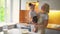 Portrait of an adorable mother and daughter preparing a daughter together in the kitchen.